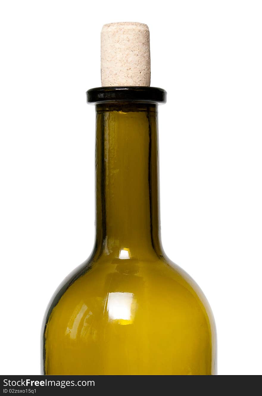 A bottle of green glass on a white background