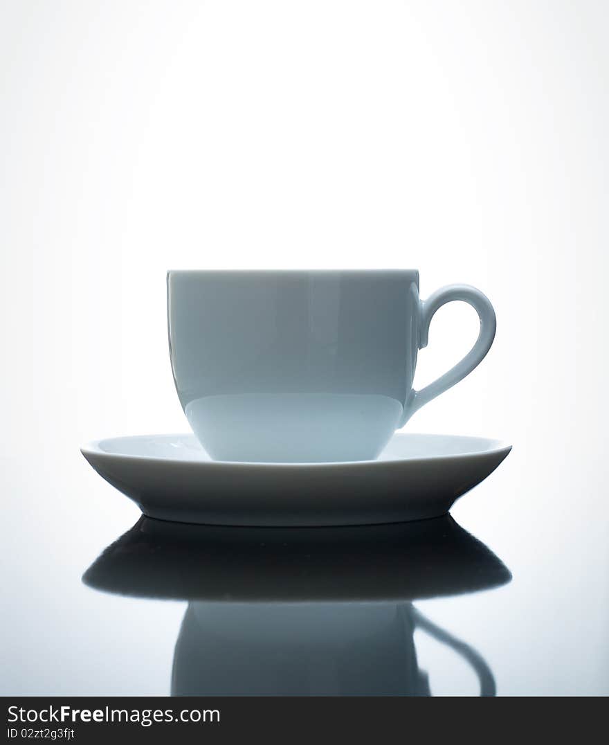 White coffee cup on a white background. White coffee cup on a white background