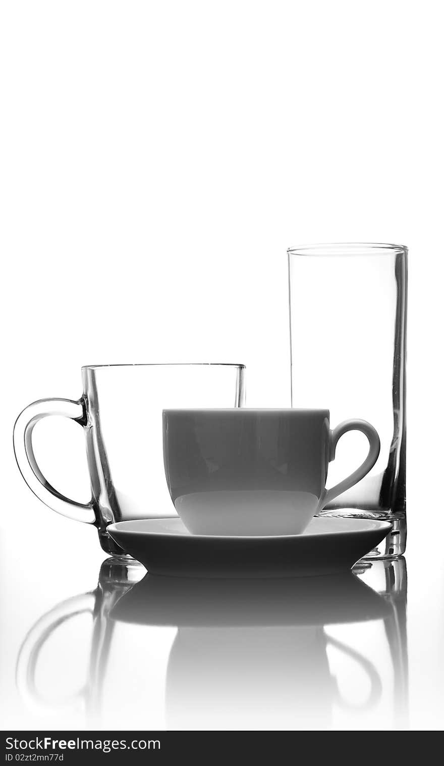 White coffee cup with saucer and glass. White coffee cup with saucer and glass