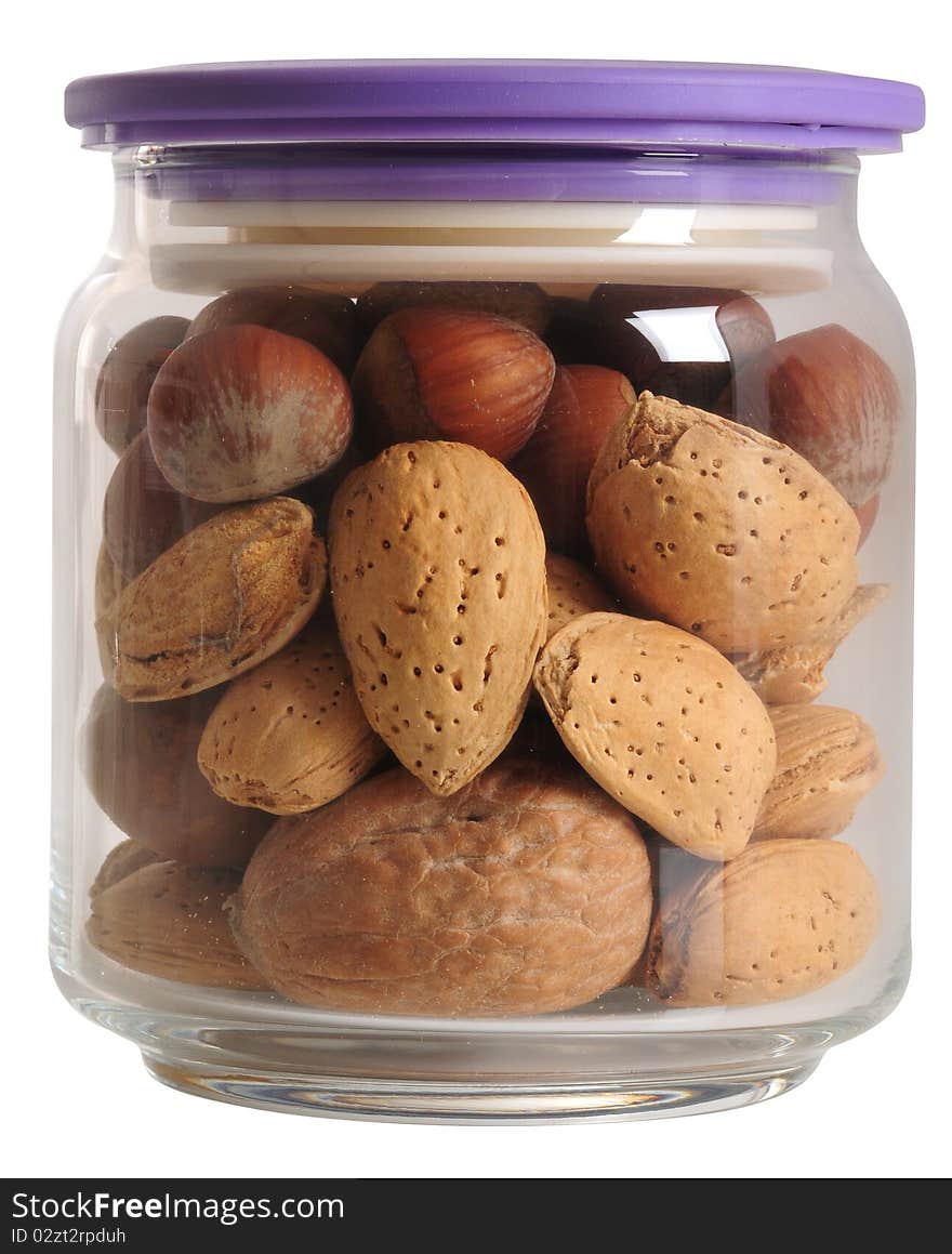 Variety of peanuts in a glass jar. Variety of peanuts in a glass jar.