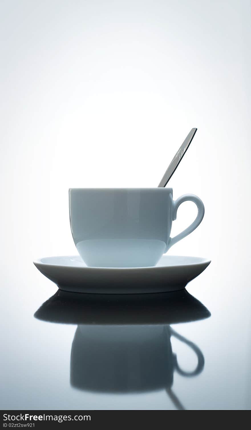 White coffee cup on a white background. White coffee cup on a white background