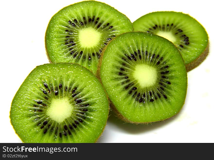 Kiwifruit slices on white background