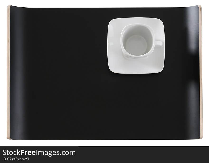 Empty coffee cup on a black tray. Empty coffee cup on a black tray.