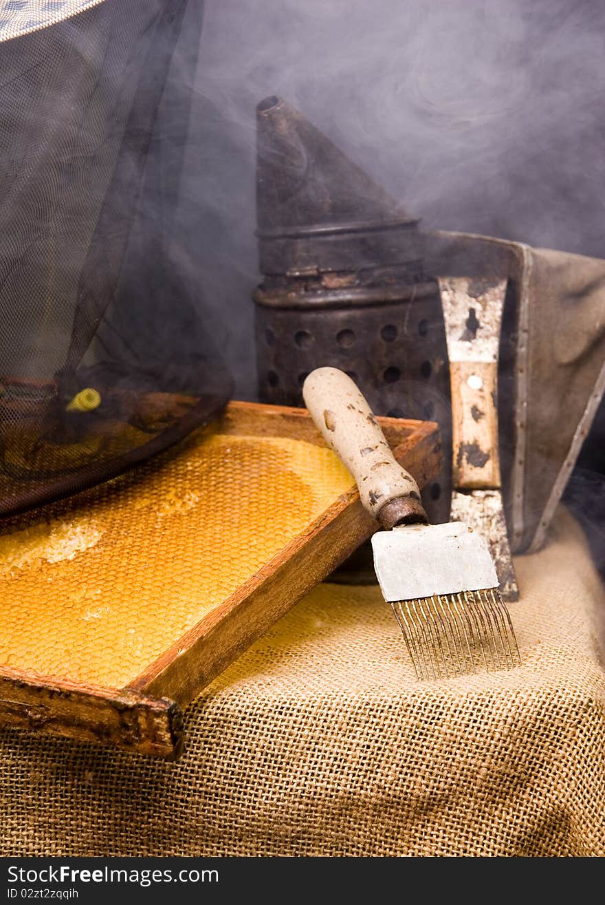 Basic attributes of every beekeeper placed on a black background in studio. Basic attributes of every beekeeper placed on a black background in studio