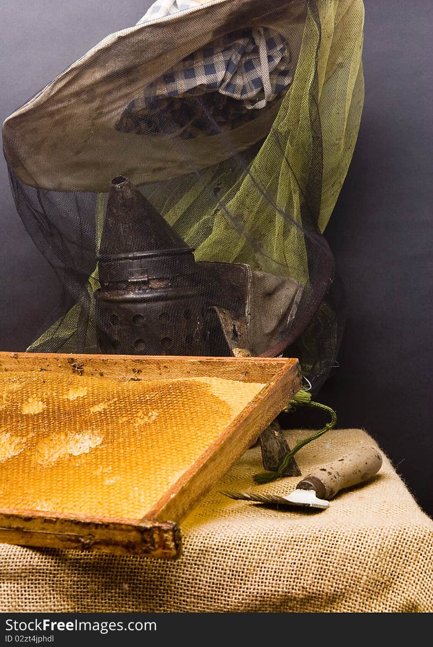 Basic attributes of every beekeeper placed on a black background in studio. Basic attributes of every beekeeper placed on a black background in studio