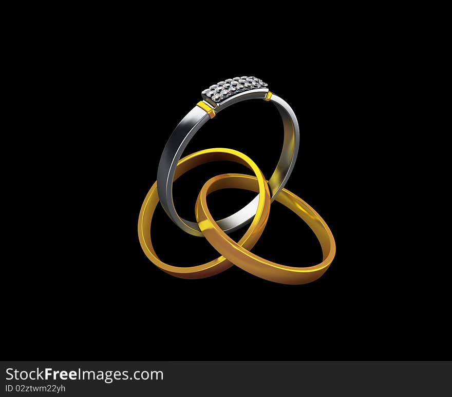 Two golden and one silver rings illustrating proposal and marriage