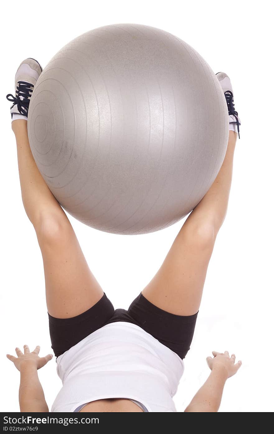 Holding fitness ball with legs