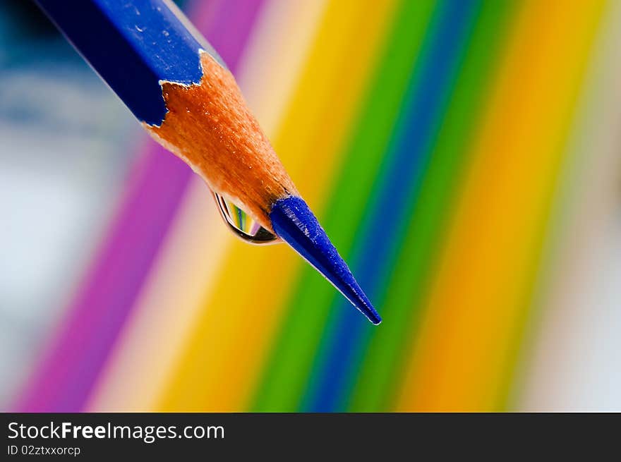 Color pencils arrange on spectrum background. Color pencils arrange on spectrum background