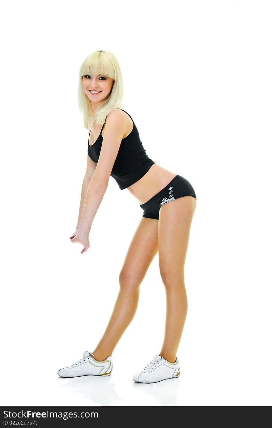 Pretty girl doing physical exercise on white background