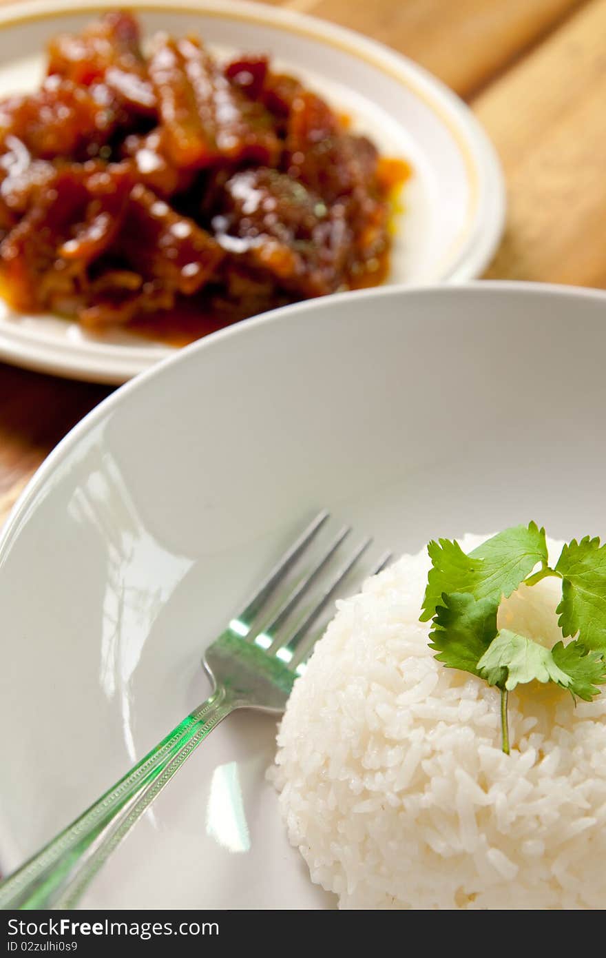 Roast pork and rice on wood background,thai food. Roast pork and rice on wood background,thai food.