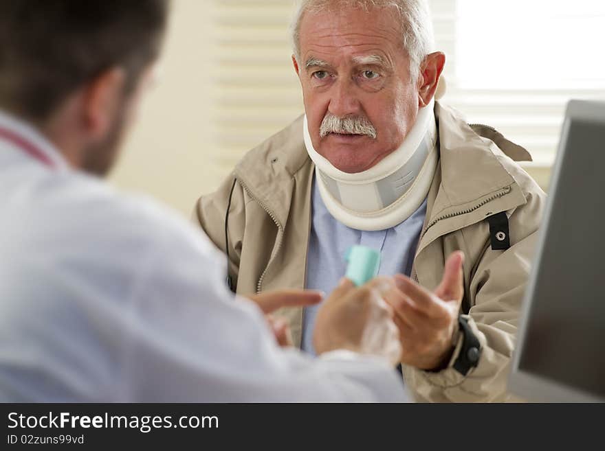 Senior man at the doctor, selective focus