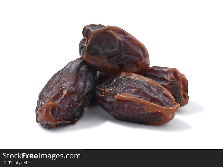 Large dried dates on the isolated background