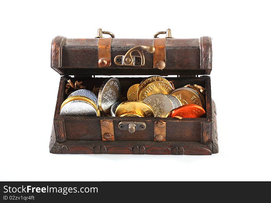 Old treasure chest with hanukkah money isolated on white background