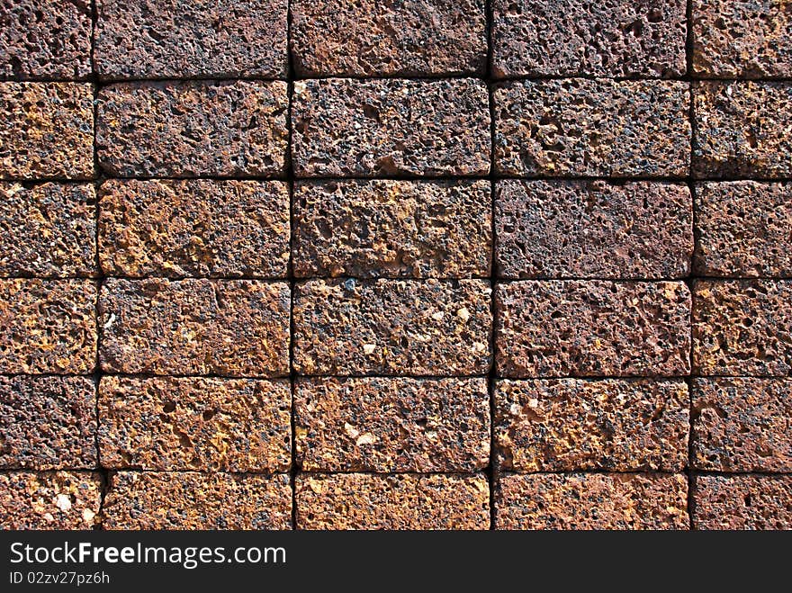 Brick brown wall stone in sunday. Brick brown wall stone in sunday.