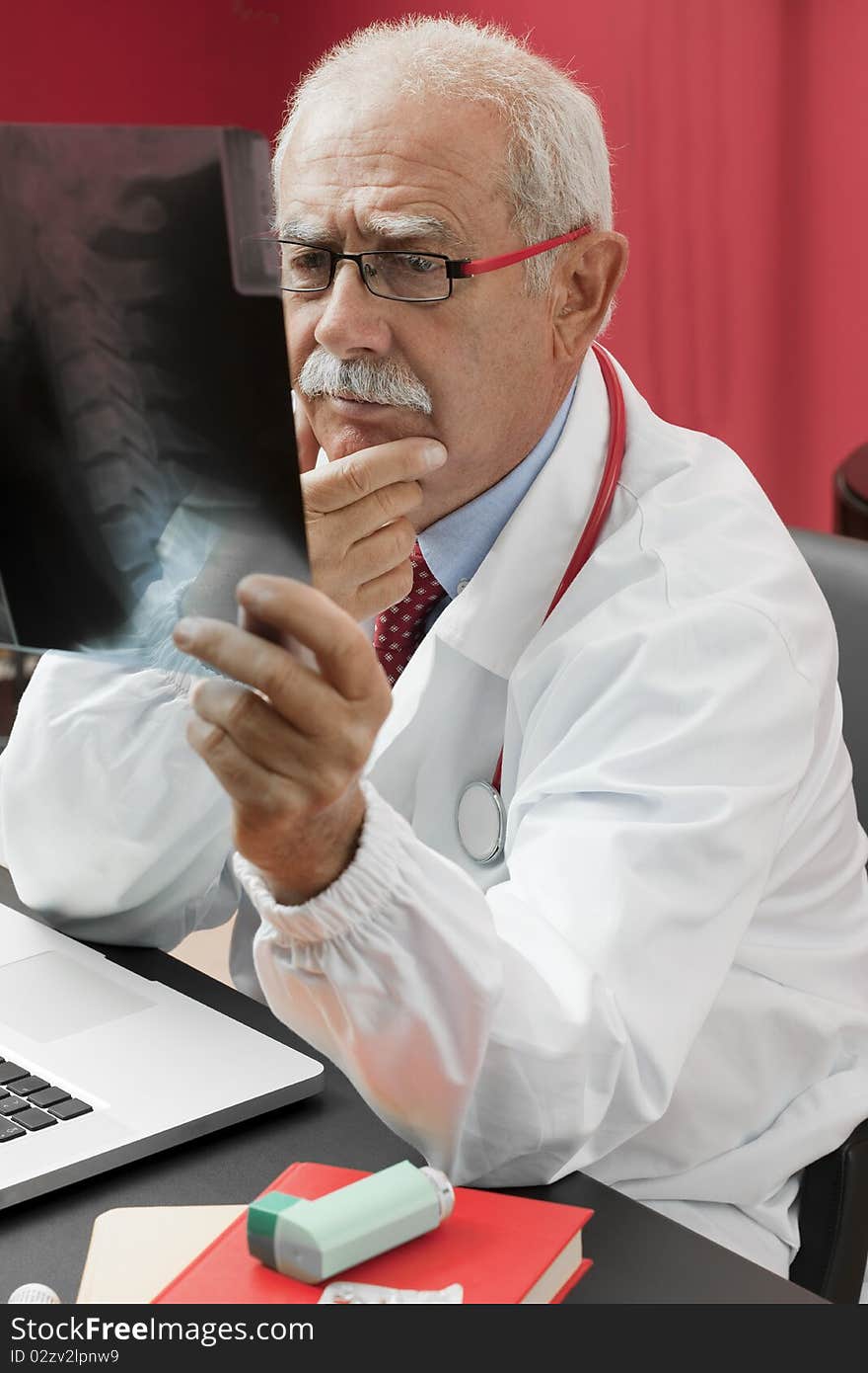 Doctor Examining X-ray