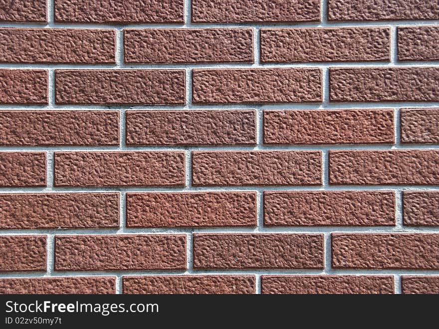 The brown brick wall in evening one day. The brown brick wall in evening one day.