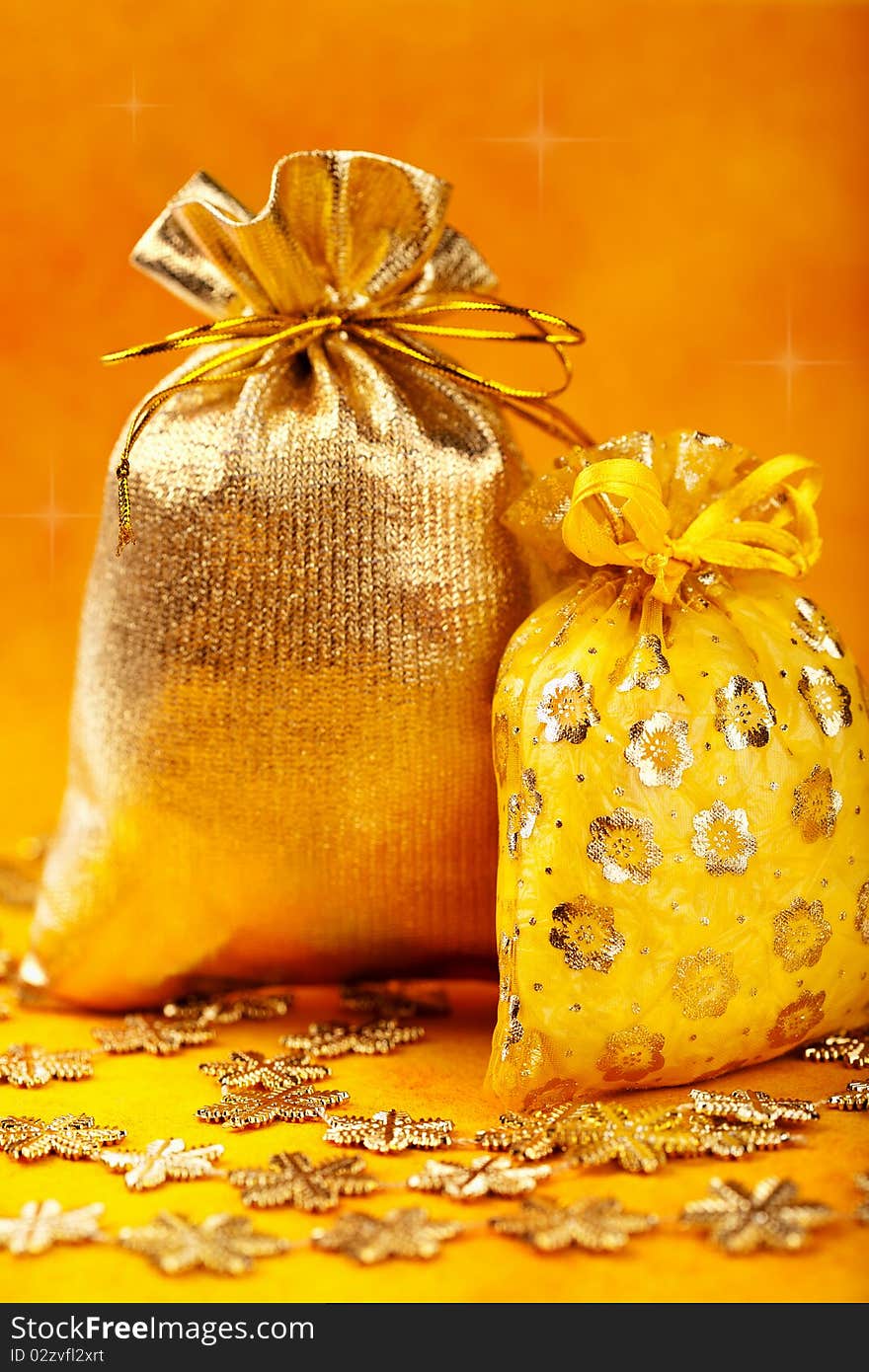 Golden Christmas Gift Sacks And Golden Snowflake