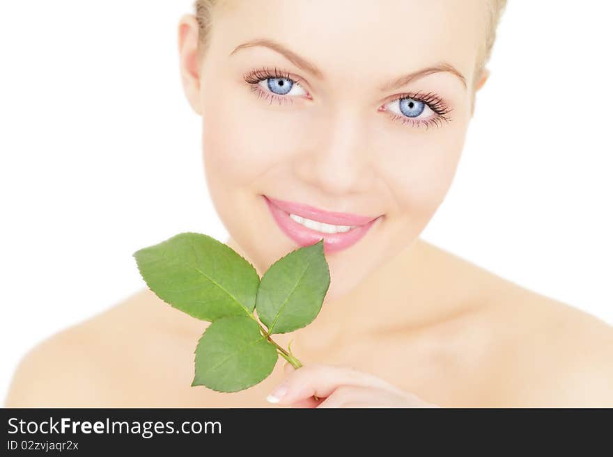 Beautiful girl holding a twig isolated on a white background