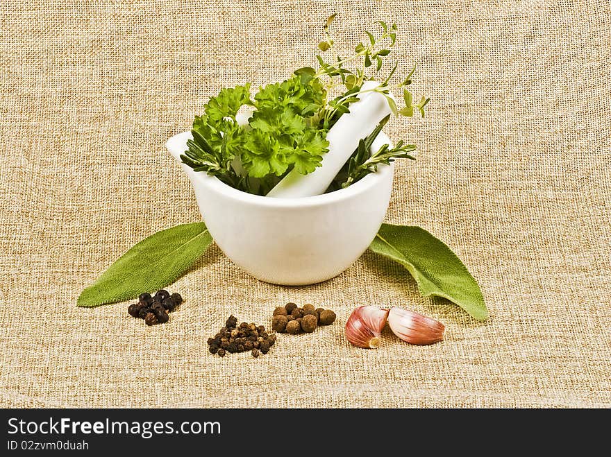 Ceramic pestle of thym, parsley, and rosemary. Ceramic pestle of thym, parsley, and rosemary