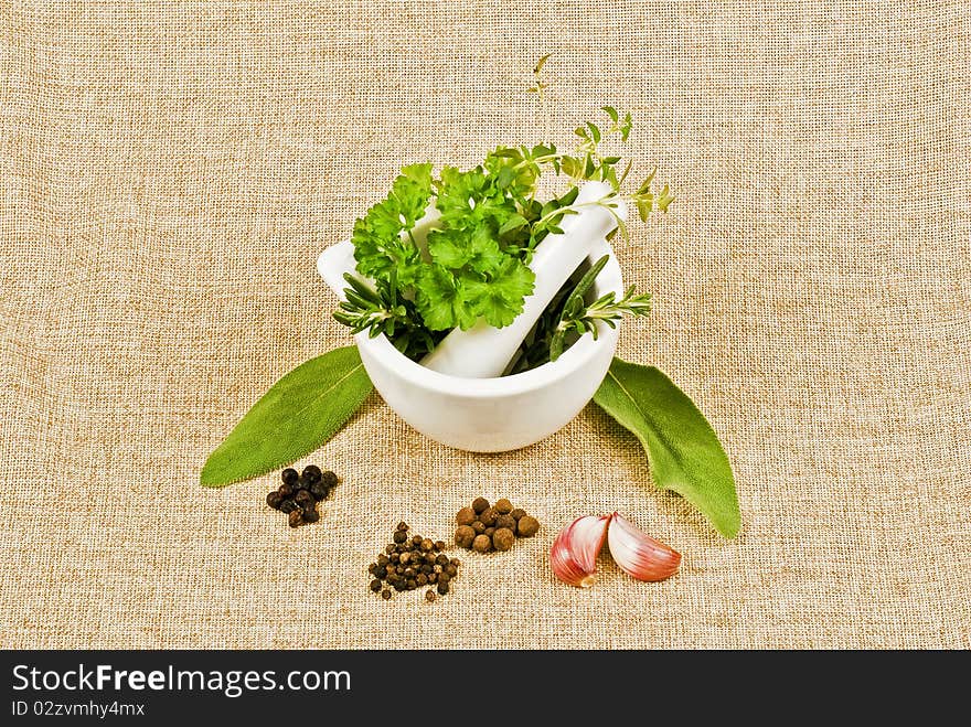 Ceramic pestle of thym, parsley, and rosemary. Ceramic pestle of thym, parsley, and rosemary