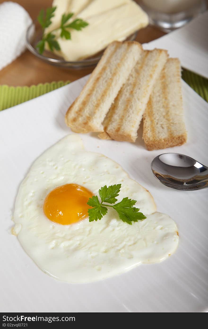 Delicious sunny side egg with roasted toast