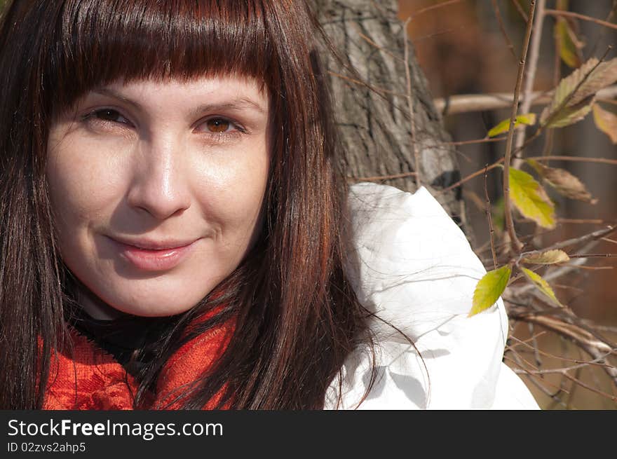 Young beautiful romantic woman in the forest