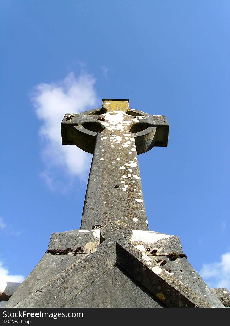 View from bottom to top of a stone, celtic high cross.