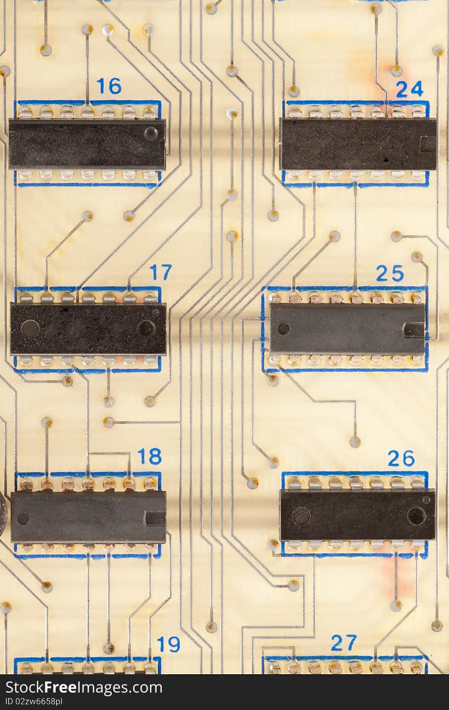 An old computer board with chips