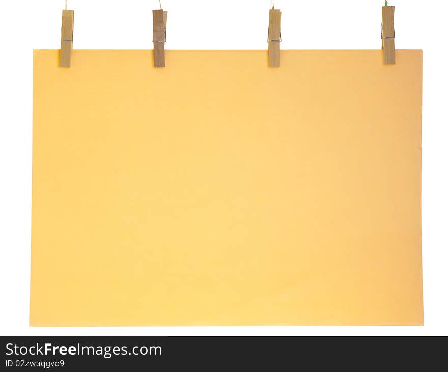 Orange blank paper sheet on a clothes line. Isolated on white background. Orange blank paper sheet on a clothes line. Isolated on white background.