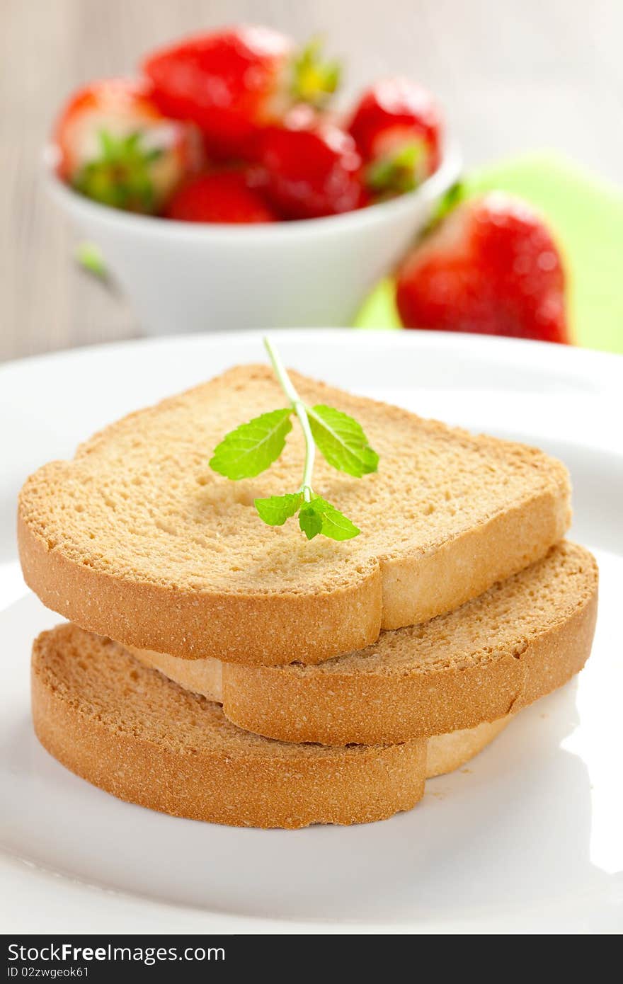 Three stacked rusk on a plate