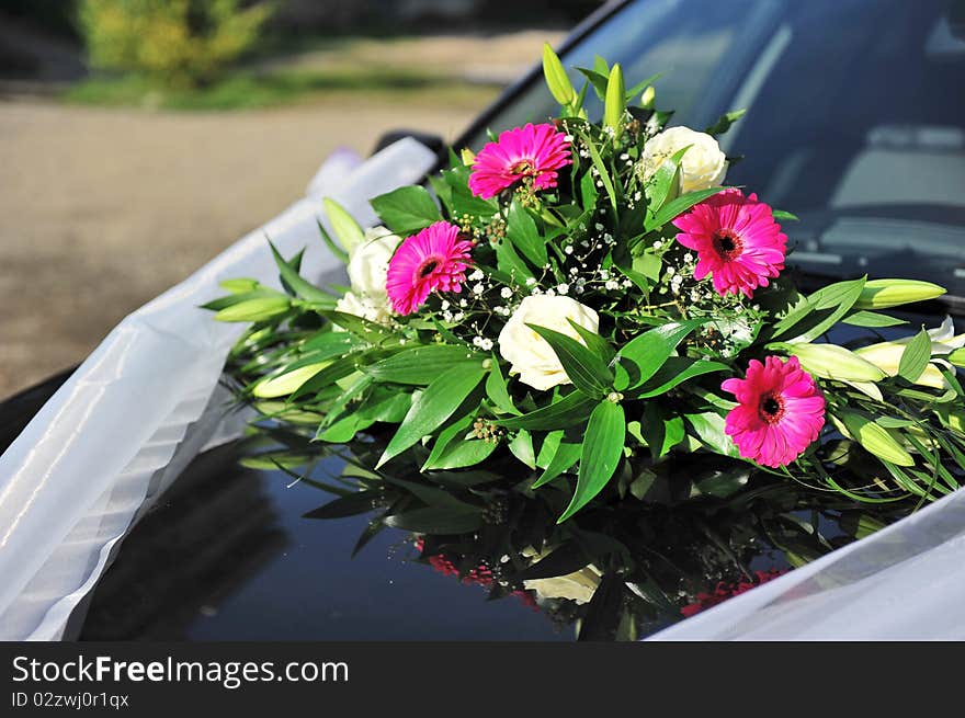 Beautiful colorful weeding flowers on car. Beautiful colorful weeding flowers on car