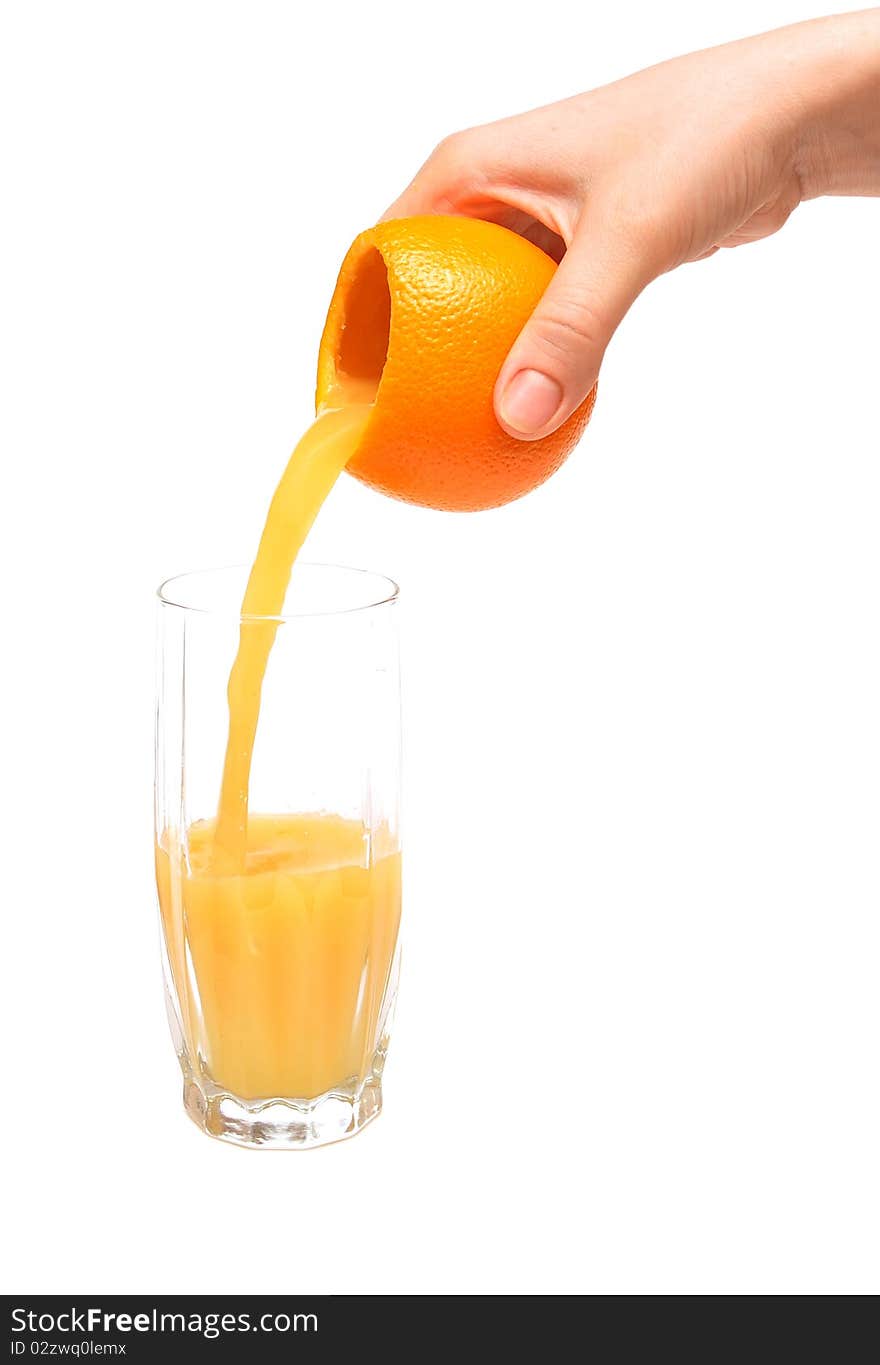 Fresh squeezed pouring orange juice isolated on a white background. Fresh squeezed pouring orange juice isolated on a white background