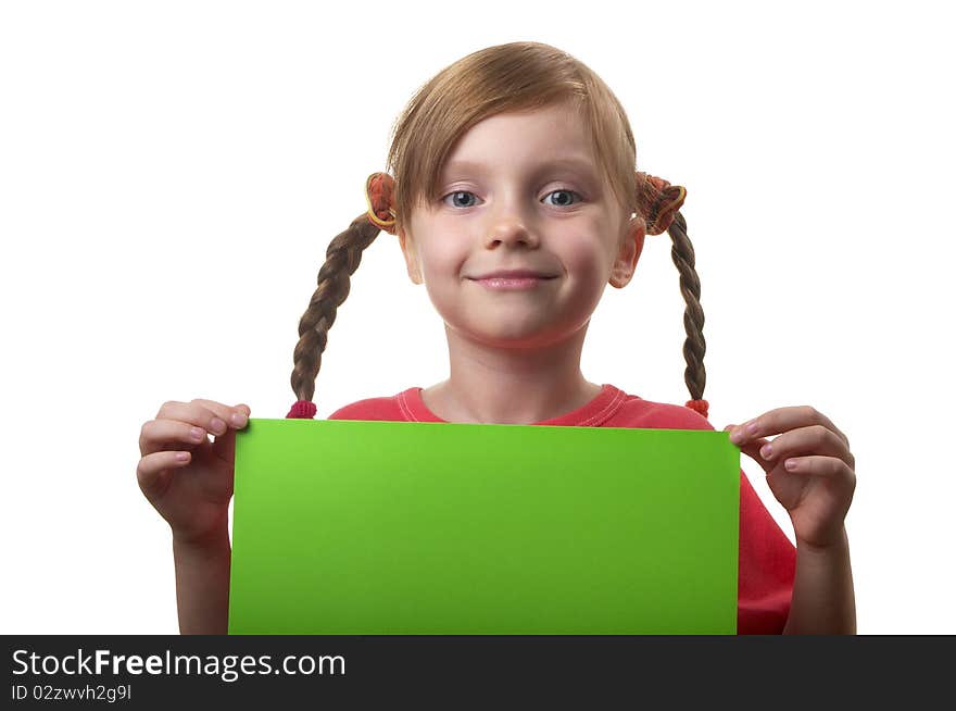 Little funny girl with green sheet of paper in the hands isolated over white background. Little funny girl with green sheet of paper in the hands isolated over white background