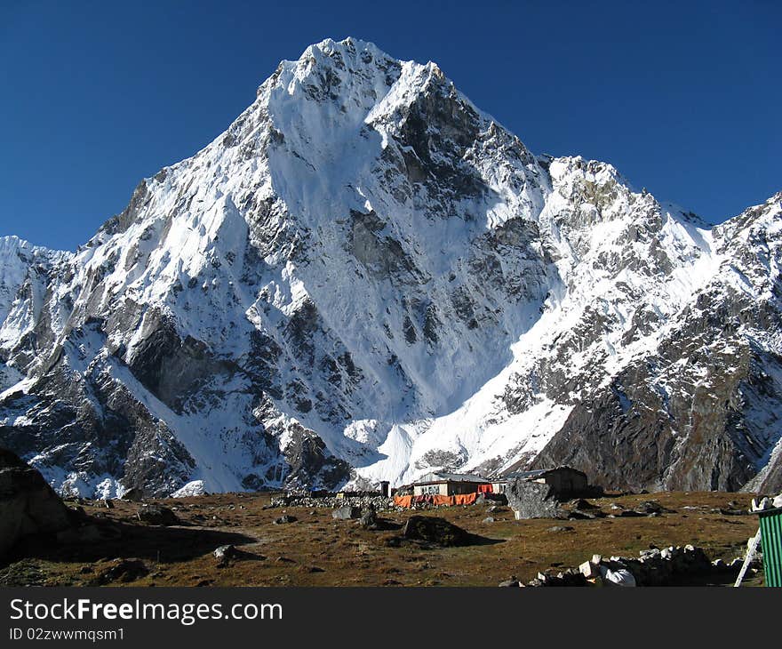 Mountain village and high mountain