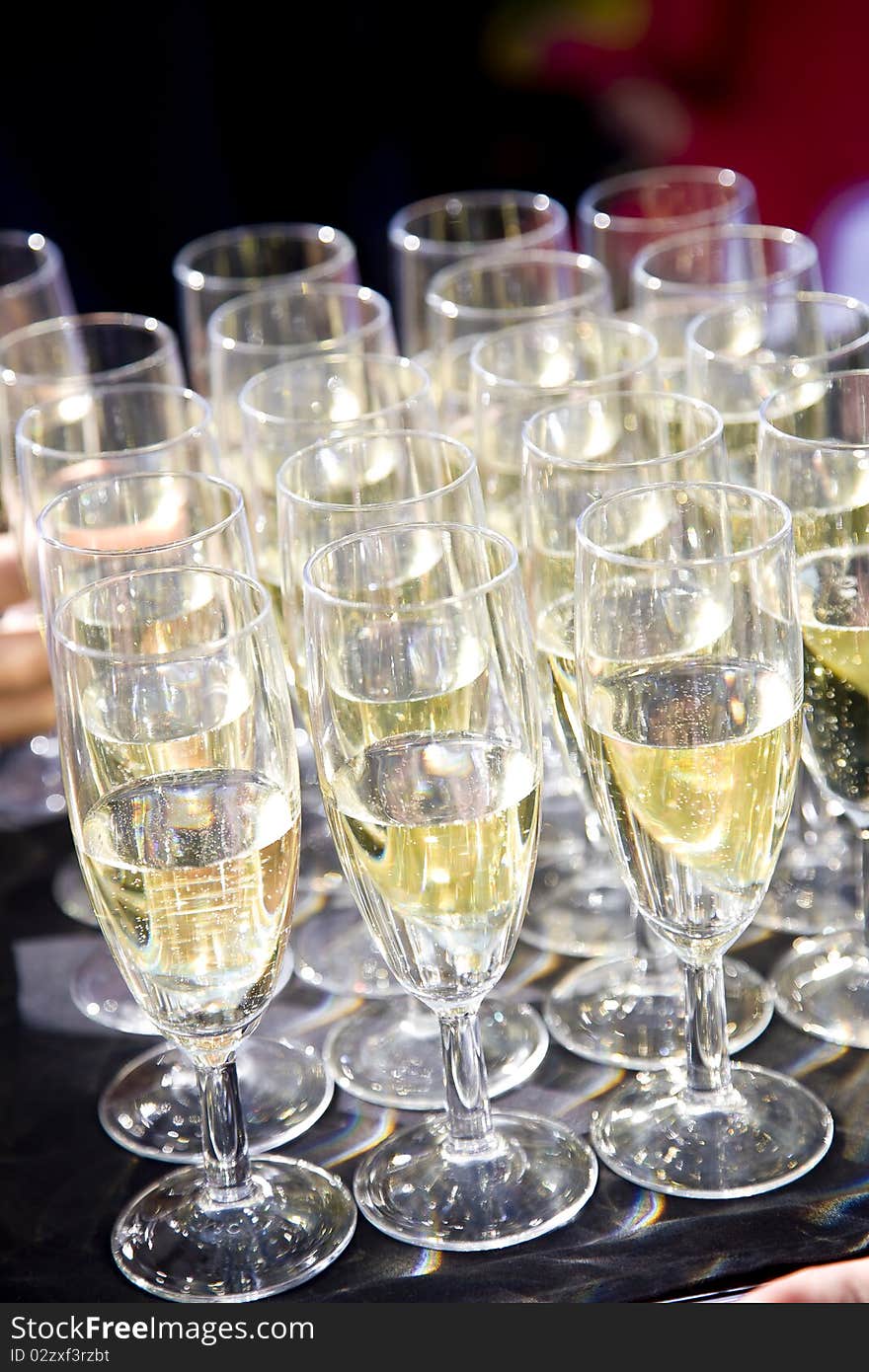 Party set of champagne flutes in a tray