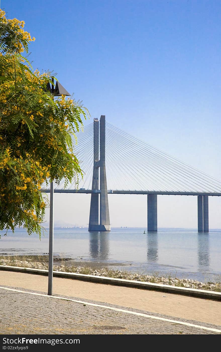 Lisbon waterfront at the Vasco da Gama bridge over the river Tagus, on the Nations park - Expo - Lisboa, Location of the NATO Lisbon summit 2010. Lisbon waterfront at the Vasco da Gama bridge over the river Tagus, on the Nations park - Expo - Lisboa, Location of the NATO Lisbon summit 2010