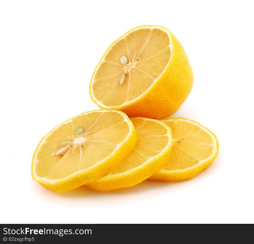 Chopped lemon slices on white background