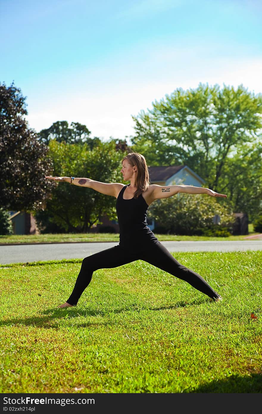 Young girl doing yoga exercise alone