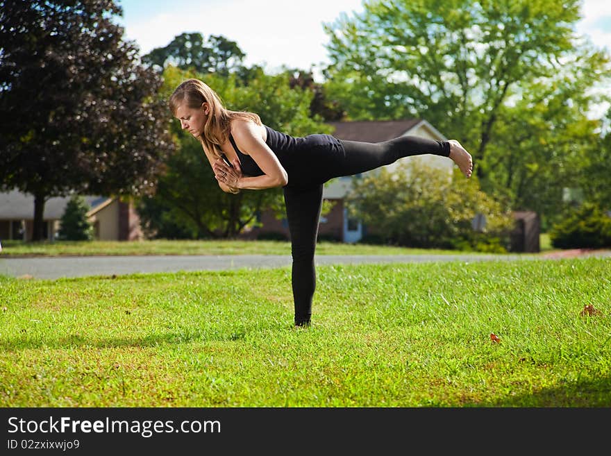 Young Girl Doing Yoga Exercise Alone