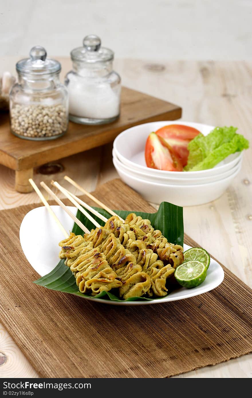 Satay from chicken bowel, known and familiar from indonesian cuisine. Satay from chicken bowel, known and familiar from indonesian cuisine