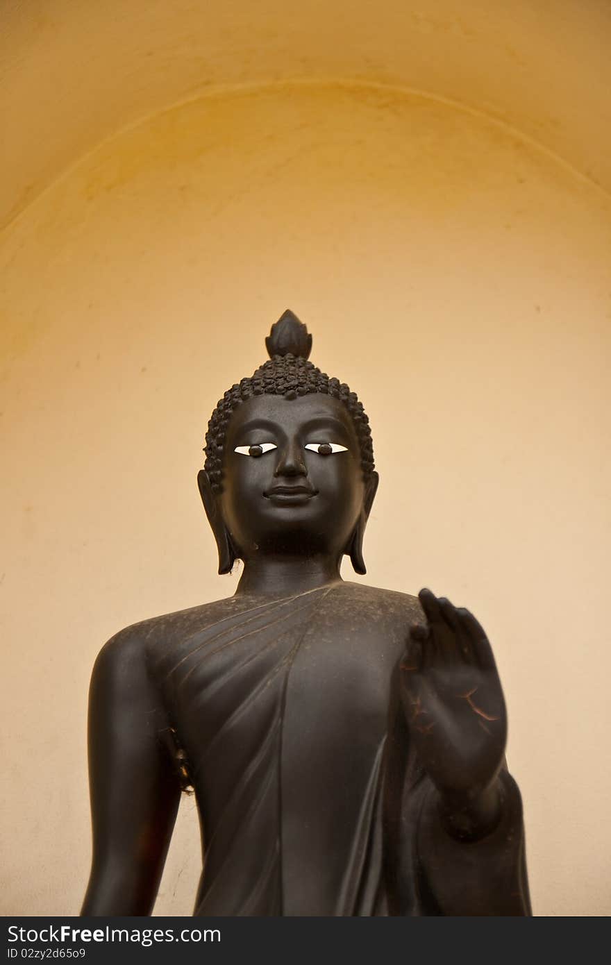 Black monk statue in the temple