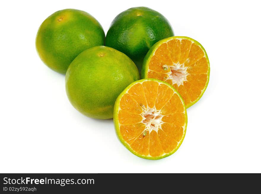 Close up of Oranges on White.