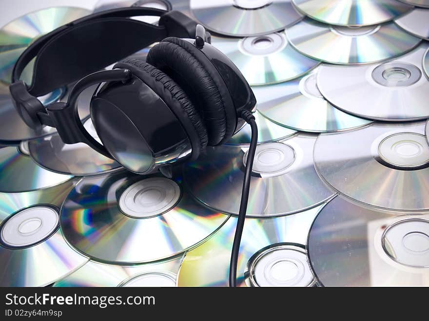 CDs background and headphones