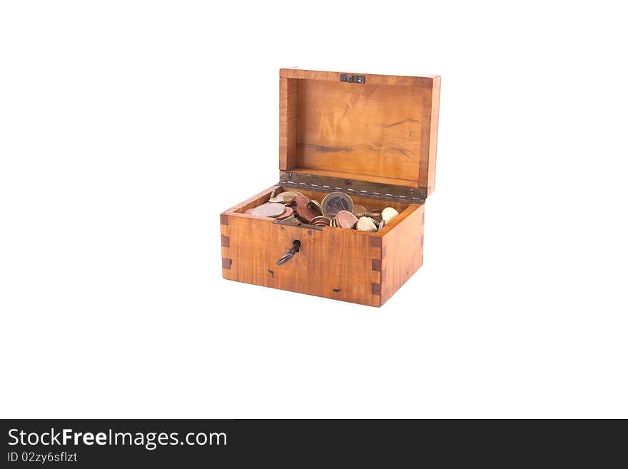 Antique handcrafted open wooden money box with small money isolated on a white background