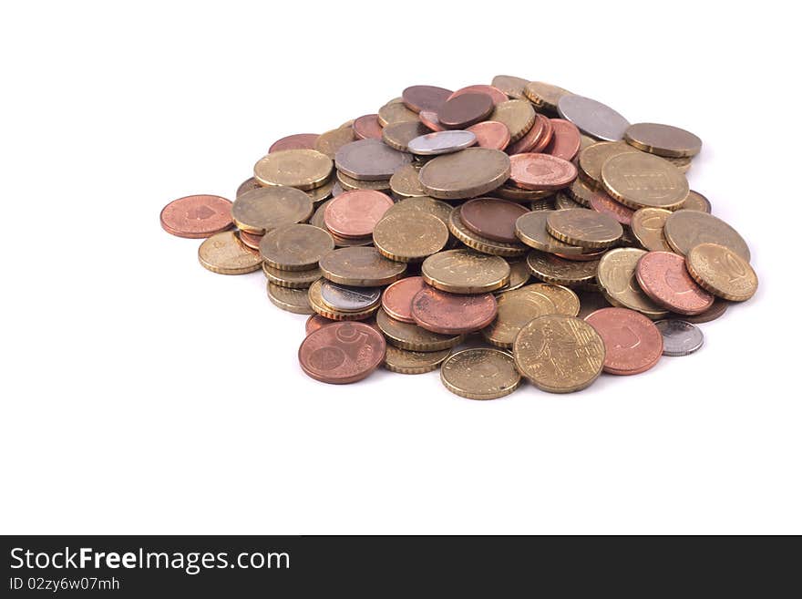 A lot of coins isolated on a white background