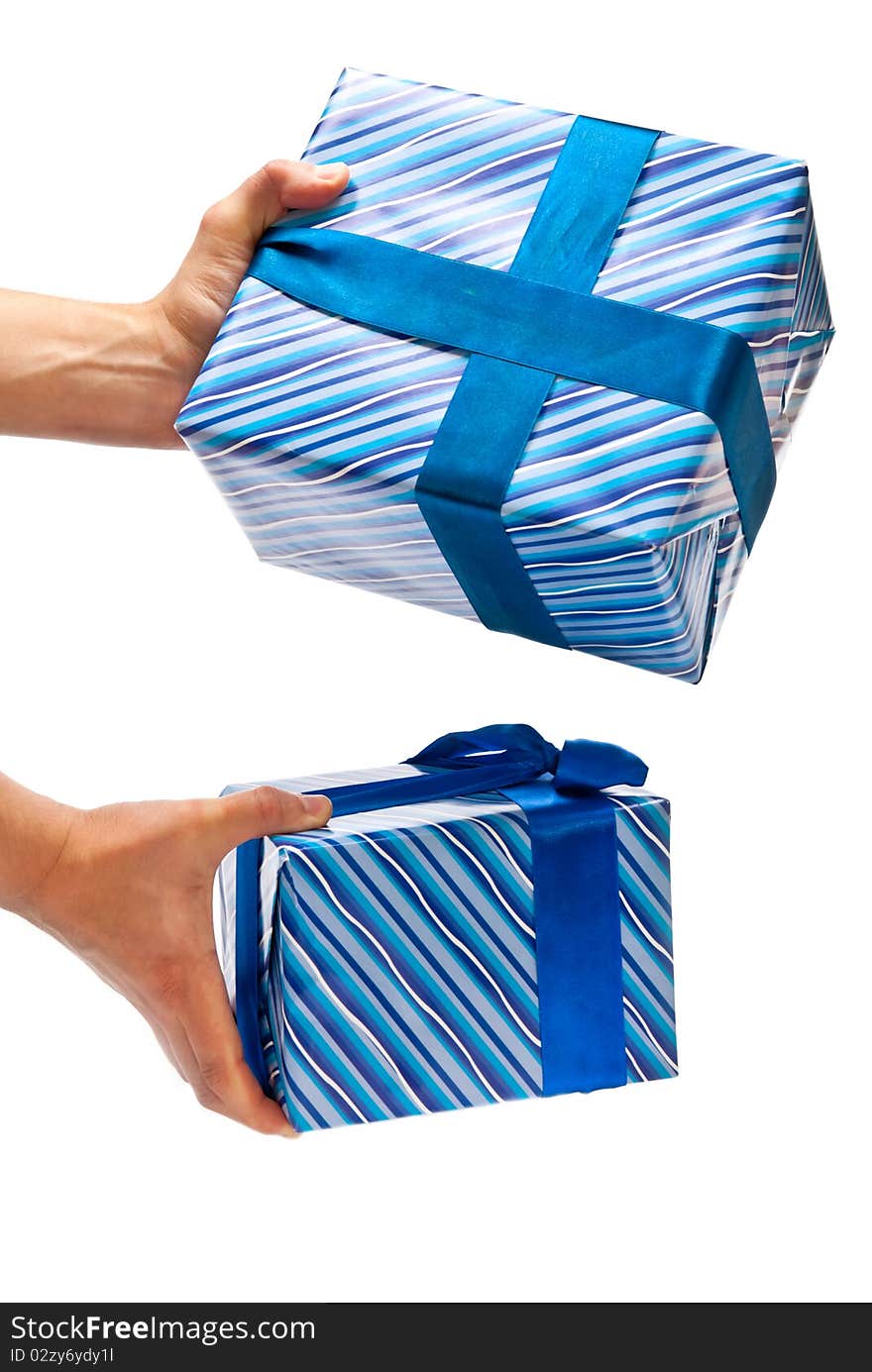 Two blue gifts boxes in man's hands. Isolated on white. Two blue gifts boxes in man's hands. Isolated on white