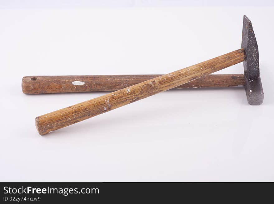 Old used small rusty hammers isolated on white background. Old used small rusty hammers isolated on white background.