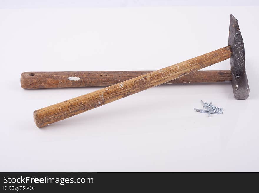 Old used small rusty hammers isolated on white background. Old used small rusty hammers isolated on white background.