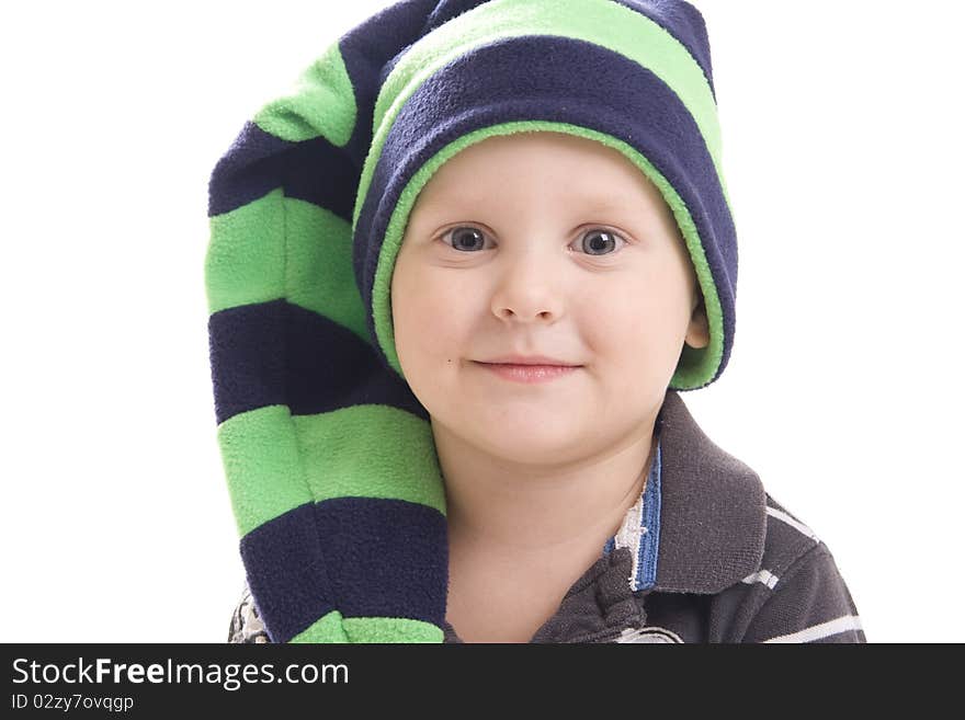 Child in a green cap on a white background