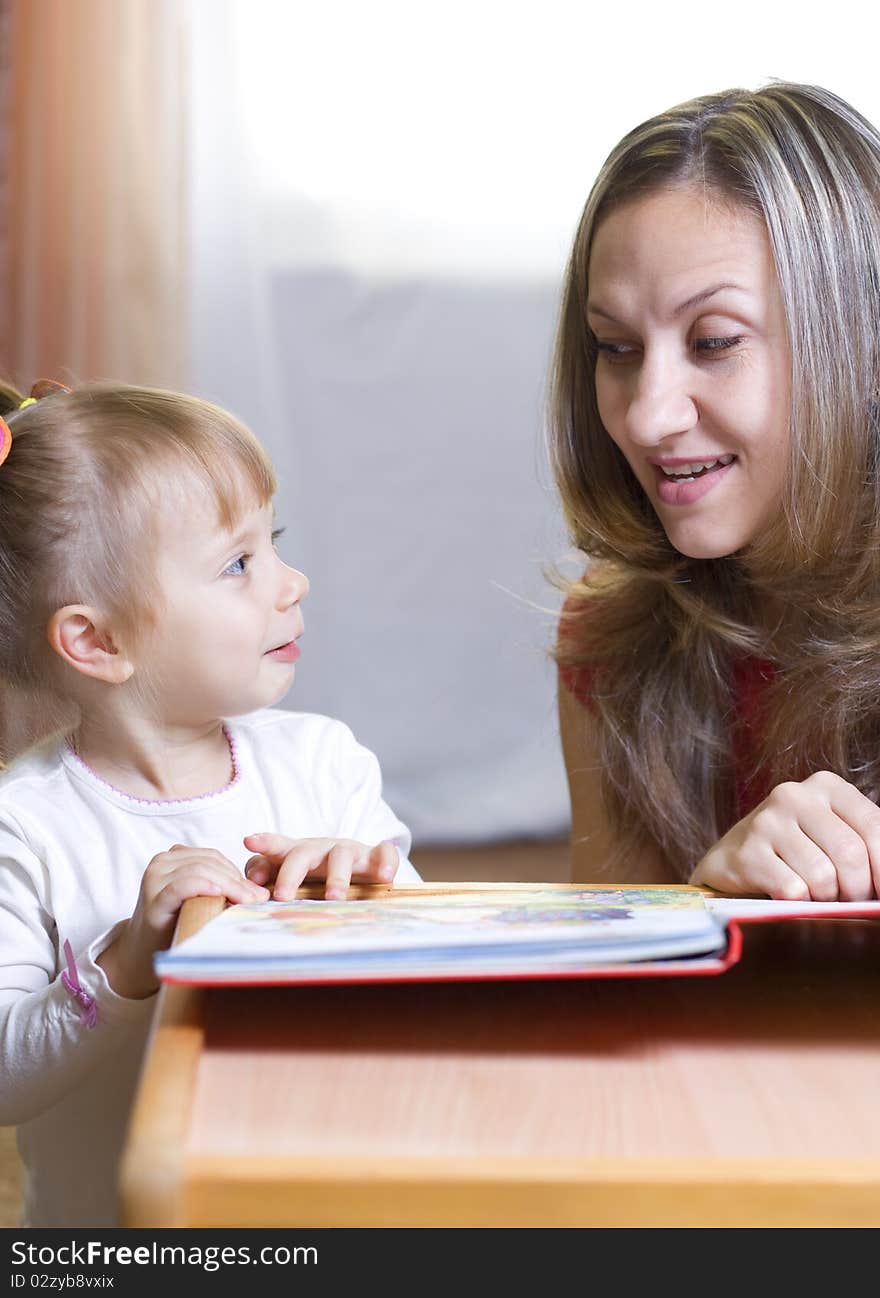 Mother And Daughter Learning At Home